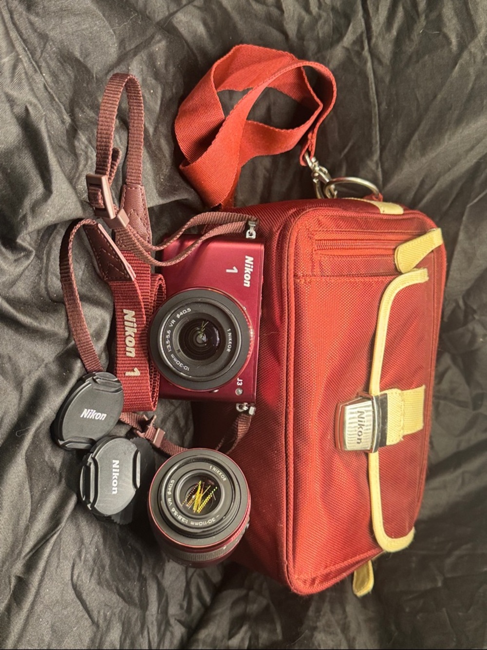 Nikon J3 Red Mirrorless Camera with Red Carrying Case and Two Lenses